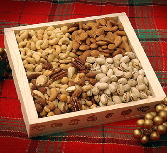 Photo of the Go Nuts basket, a decorative wooden box filled with a variety of nuts.
